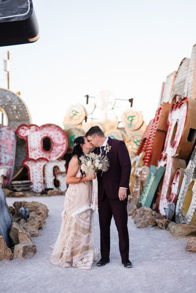 bride and groom neon museum vegas