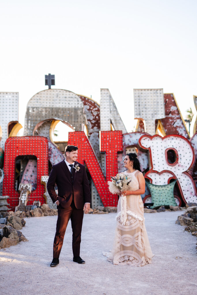 bride and groom neon museum vegas