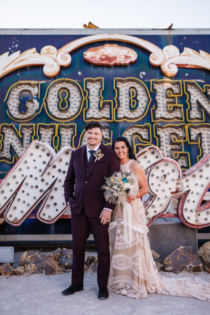 bride and groom neon museum vegas