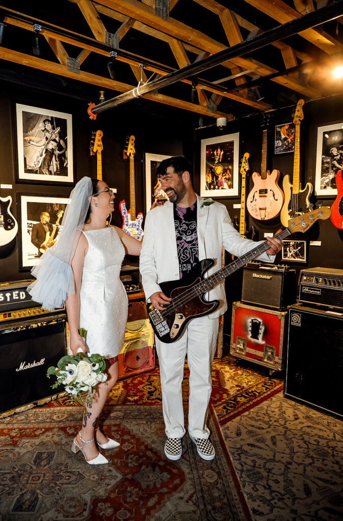 Bride and groom portraits inside the Punk Rock Museum in Las Vegas