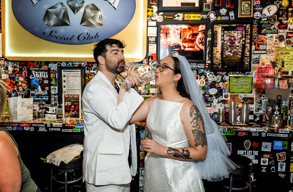 Champagne Toast Bride and Groom Punk Rock Museum